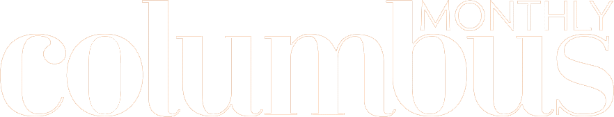 The columbus monthly logo on a green background.